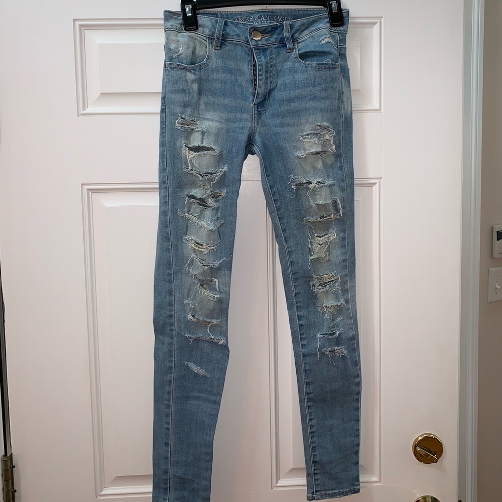 Ripped skinny jeans, light blue denim